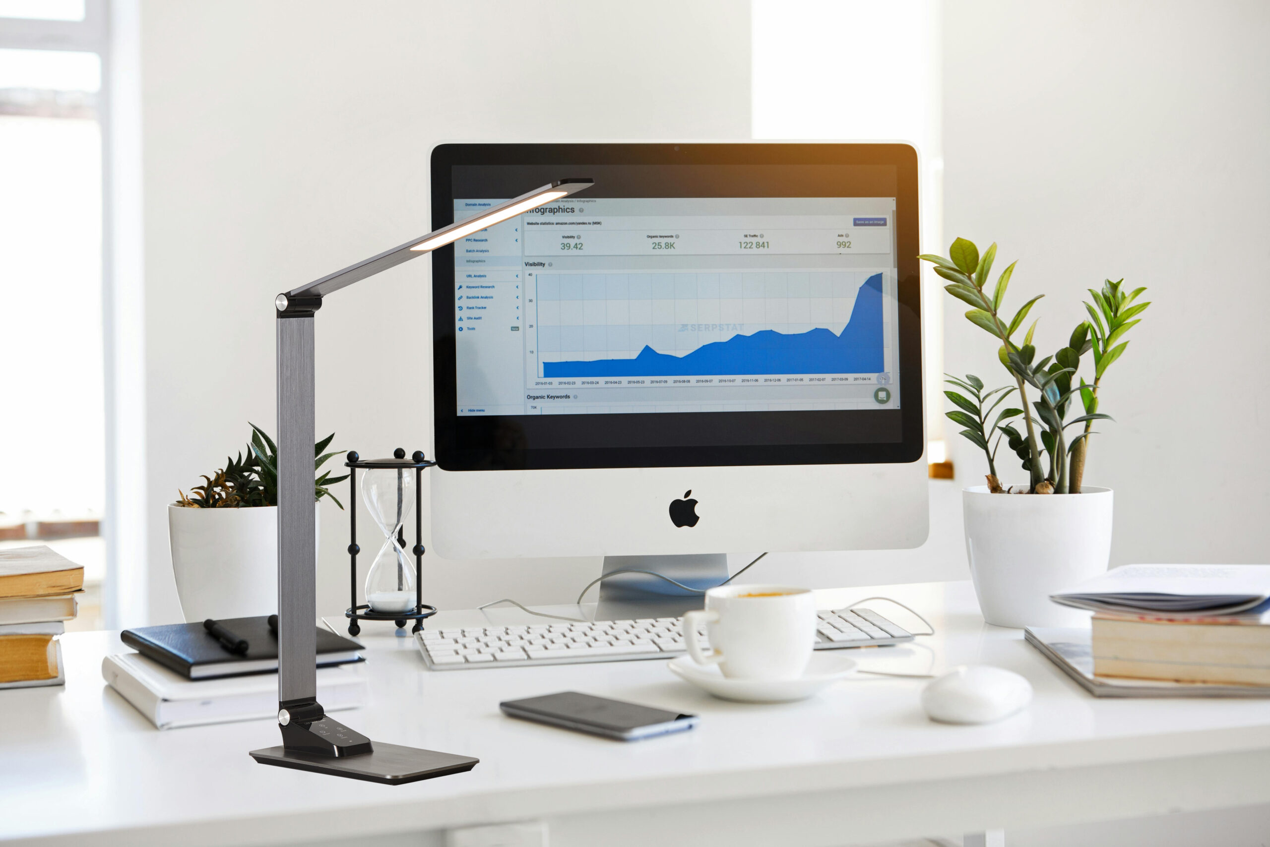 "Stylish LED desk lamp for modern offices, featuring adjustable brightness and sleek design for optimal workspace lighting."