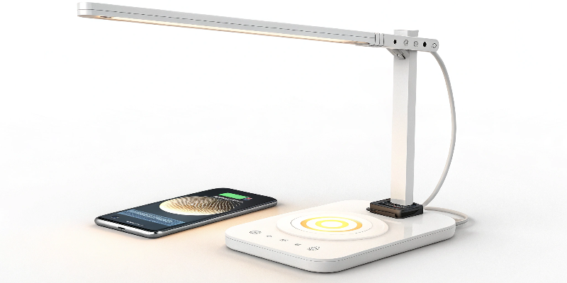 Adjustable LED desk lamp offering wireless charging and sleek aesthetics