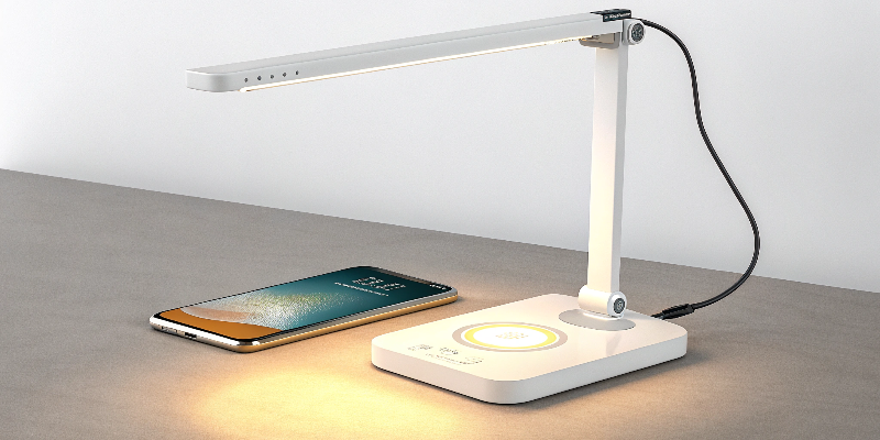 Compact LED desk lamp with wireless charging and eye-caring light