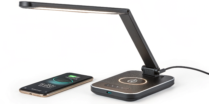 Modern LED desk lamp with a built-in phone charger and sleek design