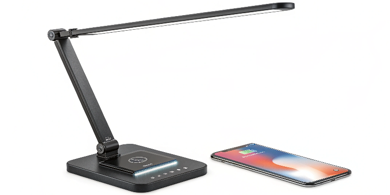 LED desk lamp with wireless charging and adjustable light levels