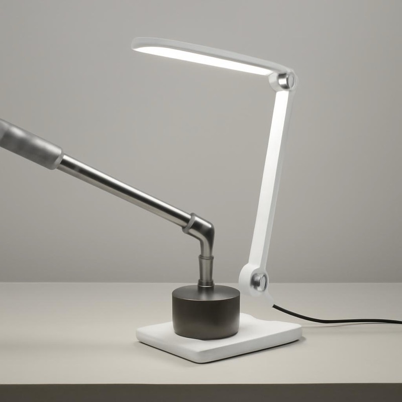 Desk lamp hinge and base stability testing